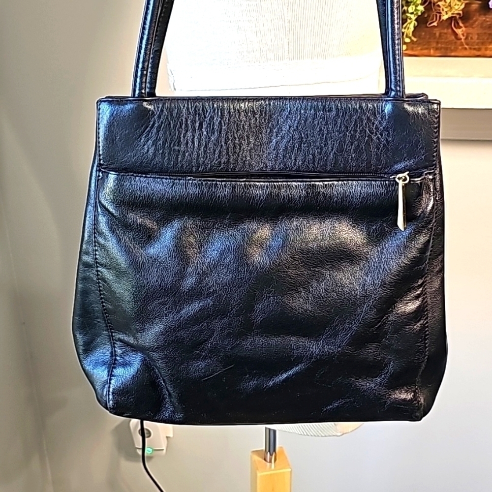 GIANI BERNINI BLACK LEATHER, vintage bag.‎ 2 handles. One outside zipper …